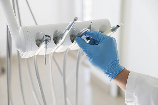 Professional Root Canal Treatment technician working in Nashville, MI